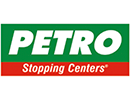 The word Petro is written in white in all caps over a green background. Below it is a smaller, red box with the words Stopping Centers® over it.